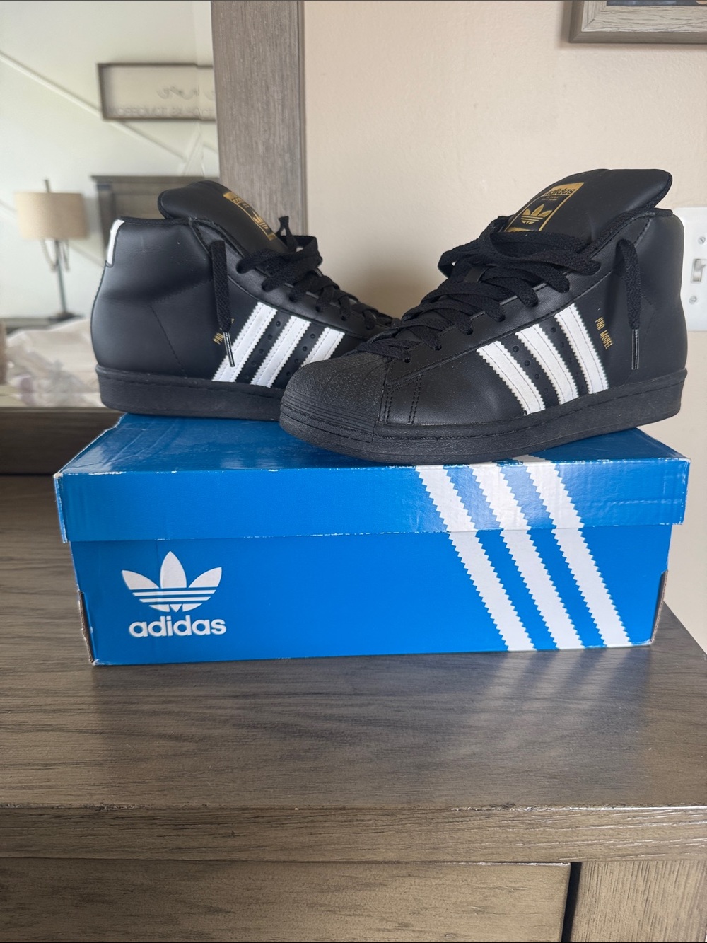 adidas Kids Black & White Mid-Top Sneakers with Gold Accents